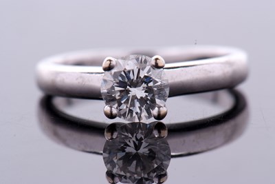 Lot 400 - A certified diamond solitaire ring, the round...