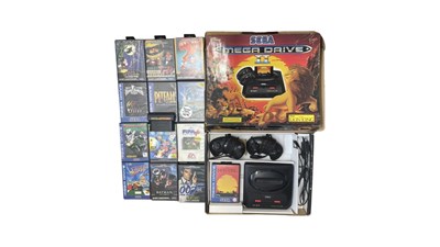 Lot 420 - A boxed Sega Mega Drive II console, game pads...