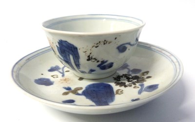 Lot 254 - A Chinese porcelain tea bowl and saucer with...