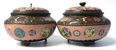 Lot 319 - A pair of Cloisonne bowls and covers raised on...