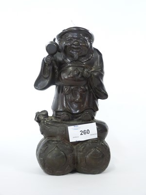 Lot 260 - A Chinese bronze of Hoti, 20cm high