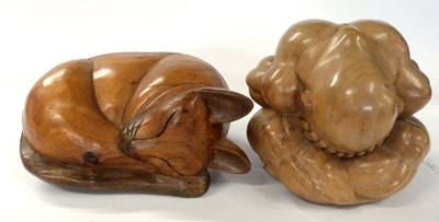 Lot 281 - Two further wooden carvings, one of a cat and...