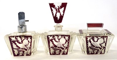 Lot 298 - A 1920's Art Deco perfume set comprising a jar...