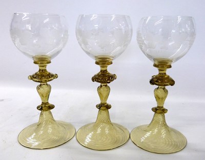 Lot 299 - Three Venetian style wine glasses, the bowls...