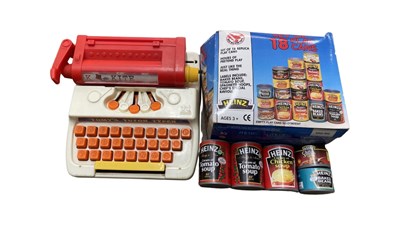 Lot 237 - A pair of retro toys, to include: - A Tomy...