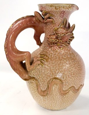 Lot 330 - A Royal Worcester style ewer with a pink...