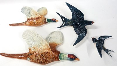 Lot 335 - A Beswick model of a Pheasant, model number 1...