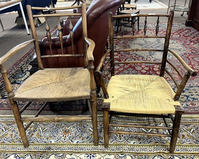 Lot 654 - A rush seated Sussex type armchair in the...