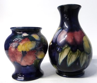 Lot 389 - A Moorcroft vase, the blue ground decorated...