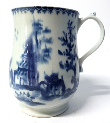 Lot 390 - An early Lowestoft porcelain tankard of bell...