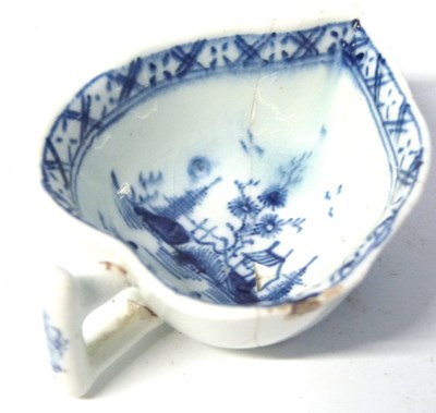 Lot 398 - Lowestoft porcelain butter boat (broken and re-...