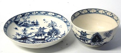 Lot 399 - Lowestoft porcelain tea bowl and saucer with a...