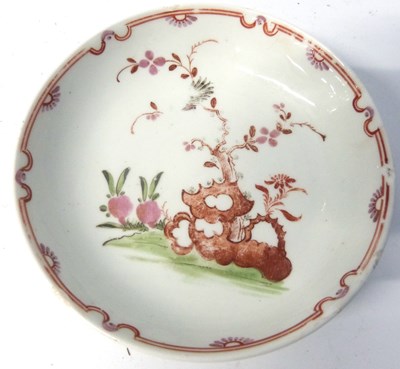 Lot 404 - A Lowestoft porcelain saucer with polychrome...