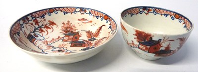 Lot 411 - Lowestoft porcelain tea bowl and saucer in...