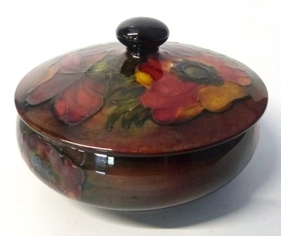 Lot 417 - A Moorcroft box and cover in the anemone...