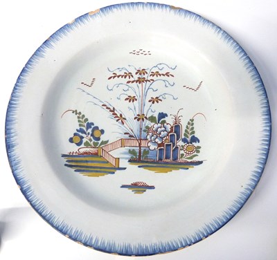 Lot 424 - Mid 18th Century English delft charger, the...