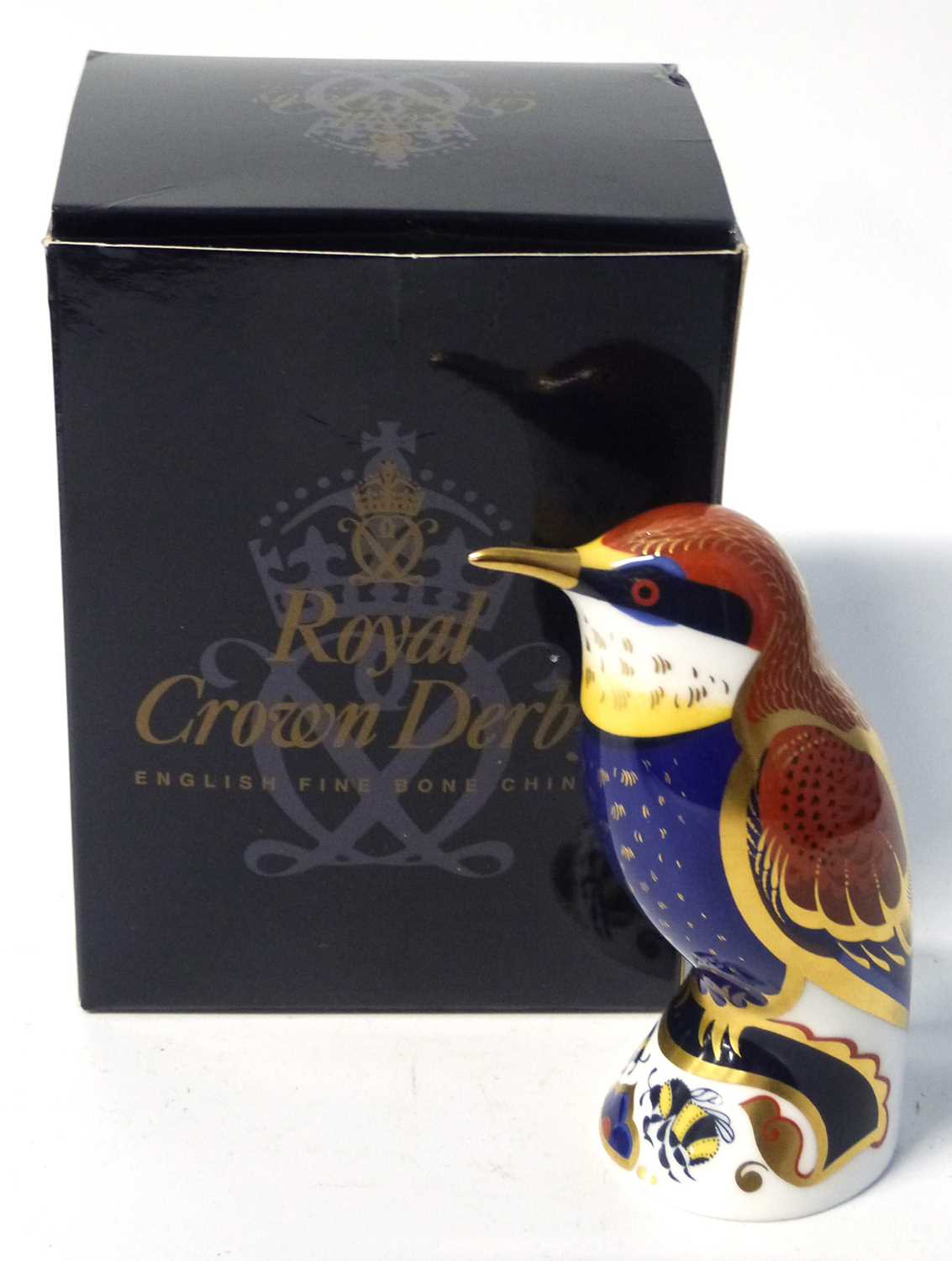 Lot 435 - A Royal Crown Derby gold stopper model of a...