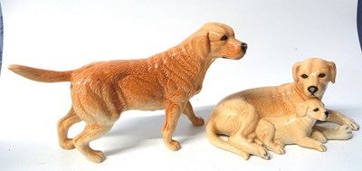 Lot 443 - A Royal Doulton model of a Labrador together...