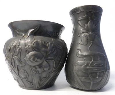 Lot 448 - A pewter vase with moulded Art Nouveau style...