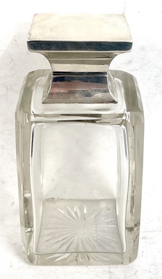 Lot 25 - A George V glass and silver mounted spirit...