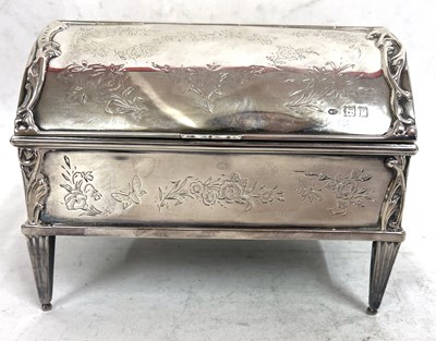 Lot 33 - An Edwardian silver jewellery box, the dome...