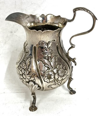 Lot 37 - George III silver cream jug having a wavy rim,...