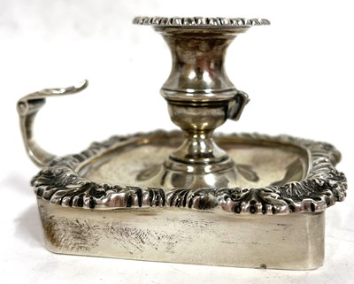 Lot 84 - An Edwardian silver chamber stick of square...