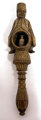 Lot 96 - An antique treen box wood nut cracker, a...