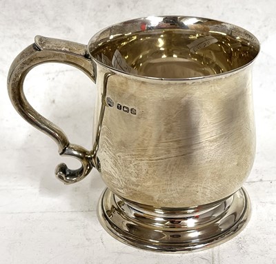 Lot 148 - A George V small silver tankard of plain...