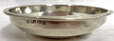 Lot 150 - An Art Deco silver dish of round plain angular...