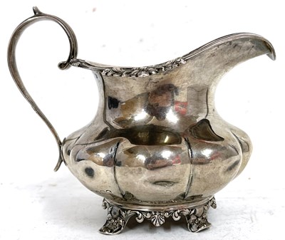 Lot 170 - Victorian silver cream jug of oval form...