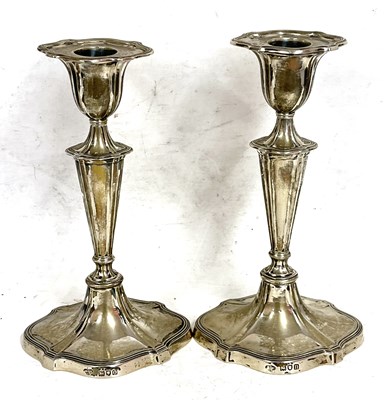 Lot 174 - Pair of Edwardian silver candlesticks, plain...