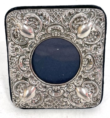 Lot 186 - A modern silver fronted photograph frame with...