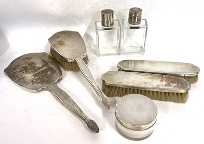 Lot 218 - An Art Deco silver backed/topped dressing...