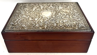 Lot 223 - Modern silver topped jewellery box embossed...