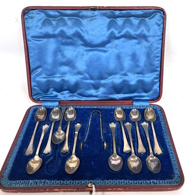 Lot 241 - Cased Edward VII silver spoon and tong set,...