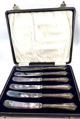 Lot 249 - Cased set of six silver handled butter knives,...