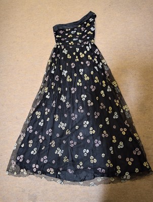 Lot 20 - A mid 20th century black and floral net...