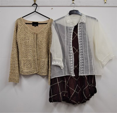 Lot 39 - A beige lace jacket/cardigan by David Emmanuel,...