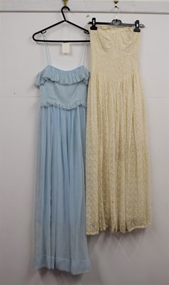 Lot 22 - A custom made cream lace strapless dress, with...