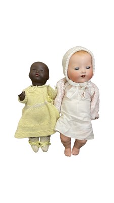 Lot 321 - A pair of European bisque head dolls, to...