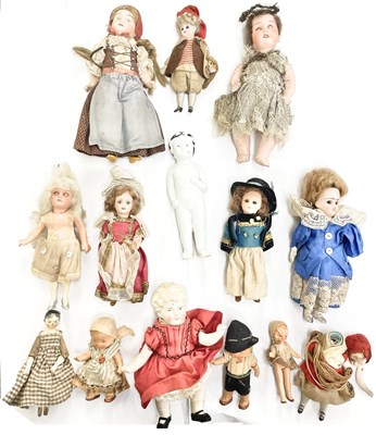 Lot 294 - A collection of various miniature dolls, to...