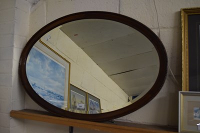 Lot 208 - EARLY 20TH CENTURY OVAL BEVELLED WALL MIRROR,...