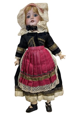 Lot 334 - An SFBJ French bisque head doll, wearing...