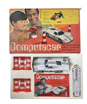 Lot 415 - A boxed 1960s electronic Computacar by Mettoy