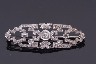 Lot 383 - An Art Deco diamond brooch, set to centre with...