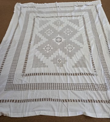 Lot 204 - A white cotton drawn thread work tablecloth,...