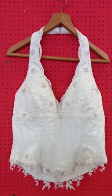 Lot 65 - Assorted bridal wear to include a net lace and...