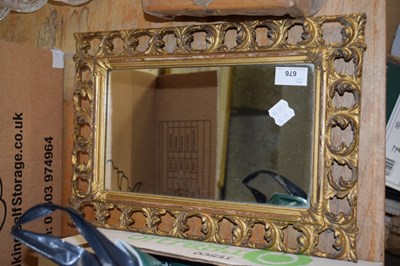 Lot 676 - SMALL WALL MIRROR IN FLORAL GILT FRAME