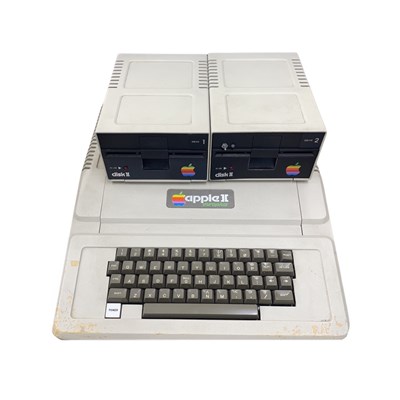 Lot 391 - A 1977 Apple II series computer with 2 disc...